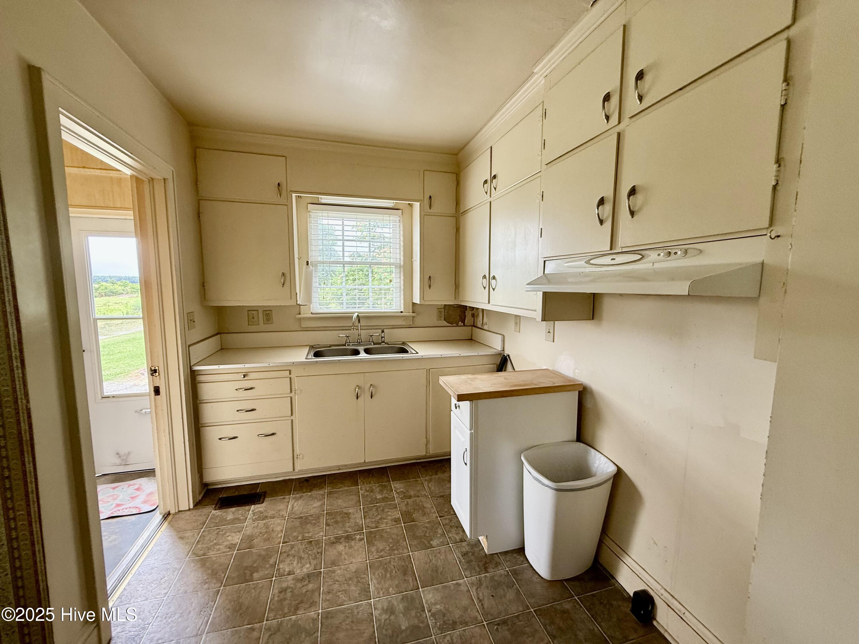 110 North Main Street Colerain, NC 27924 - Photo 10 of 31 Kitchen w view of back porch door