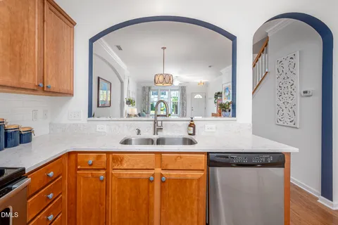 a bathroom with a sink a mirror and vanity