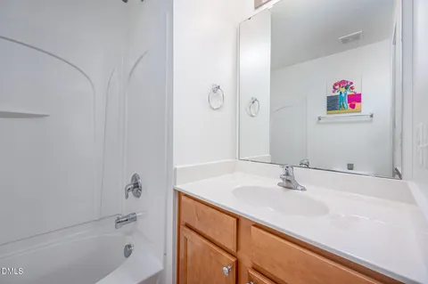 a bathroom with a sink and a bathtub