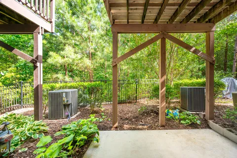 a garden view with a seating space