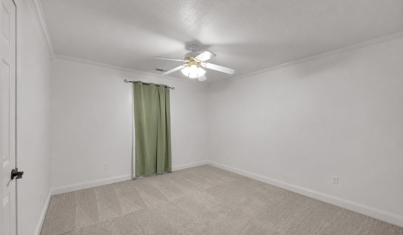 23 Matrix Cove Jackson, TN 38305 - Photo 15 of 16 a view of a room with a ceiling fan and a chandelier fan