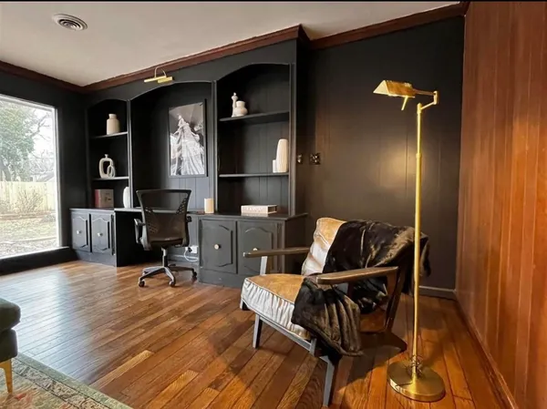 a view of a livingroom with furniture and a way to room