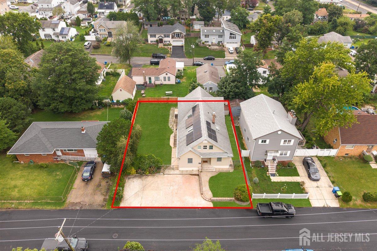 281 Prospect Avenue Old Bridge, NJ 08879 - Photo 4 of 29 an aerial view of residential houses with outdoor space