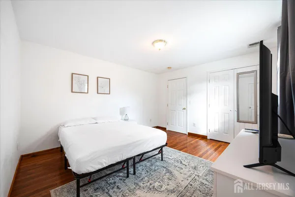 a living room with a rug