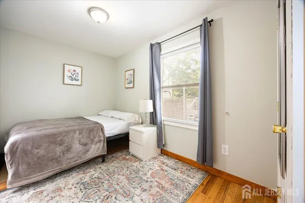 a room with a bed and a window