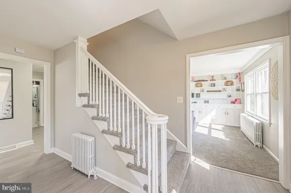 a view of livingroom with furniture and white walls