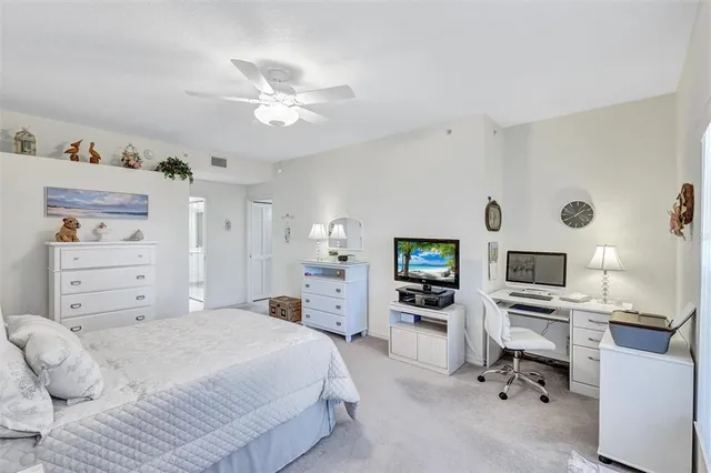 a bedroom with a bed and furniture