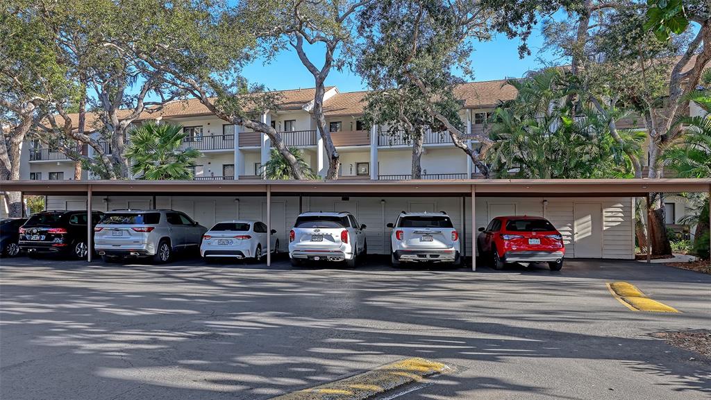 1196 Bird Bay Way, Unit 310 Venice, FL 34285 - Photo 21 of 37 a view of a cars parking space