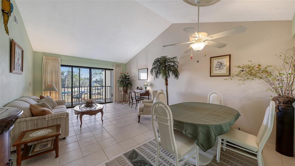 1196 Bird Bay Way, Unit 310 Venice, FL 34285 - Photo 8 of 37 a view of a livingroom and dining room