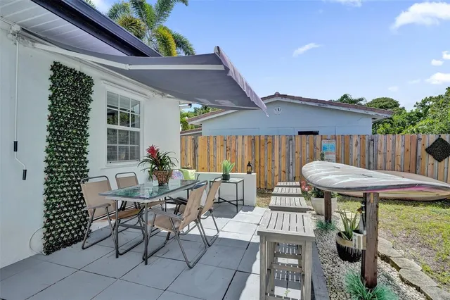 a view of a table and chairs in patio