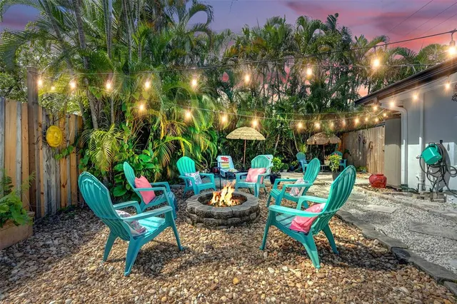 a chair and a table in a backyard