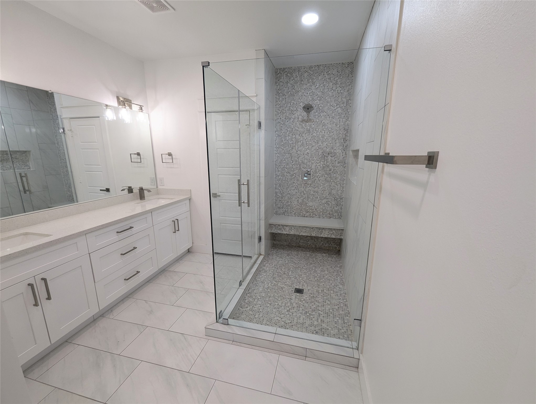 4913 Fisk Street Houston, TX 77009 - Photo 16 of 27 a bathroom with a shower and a sink