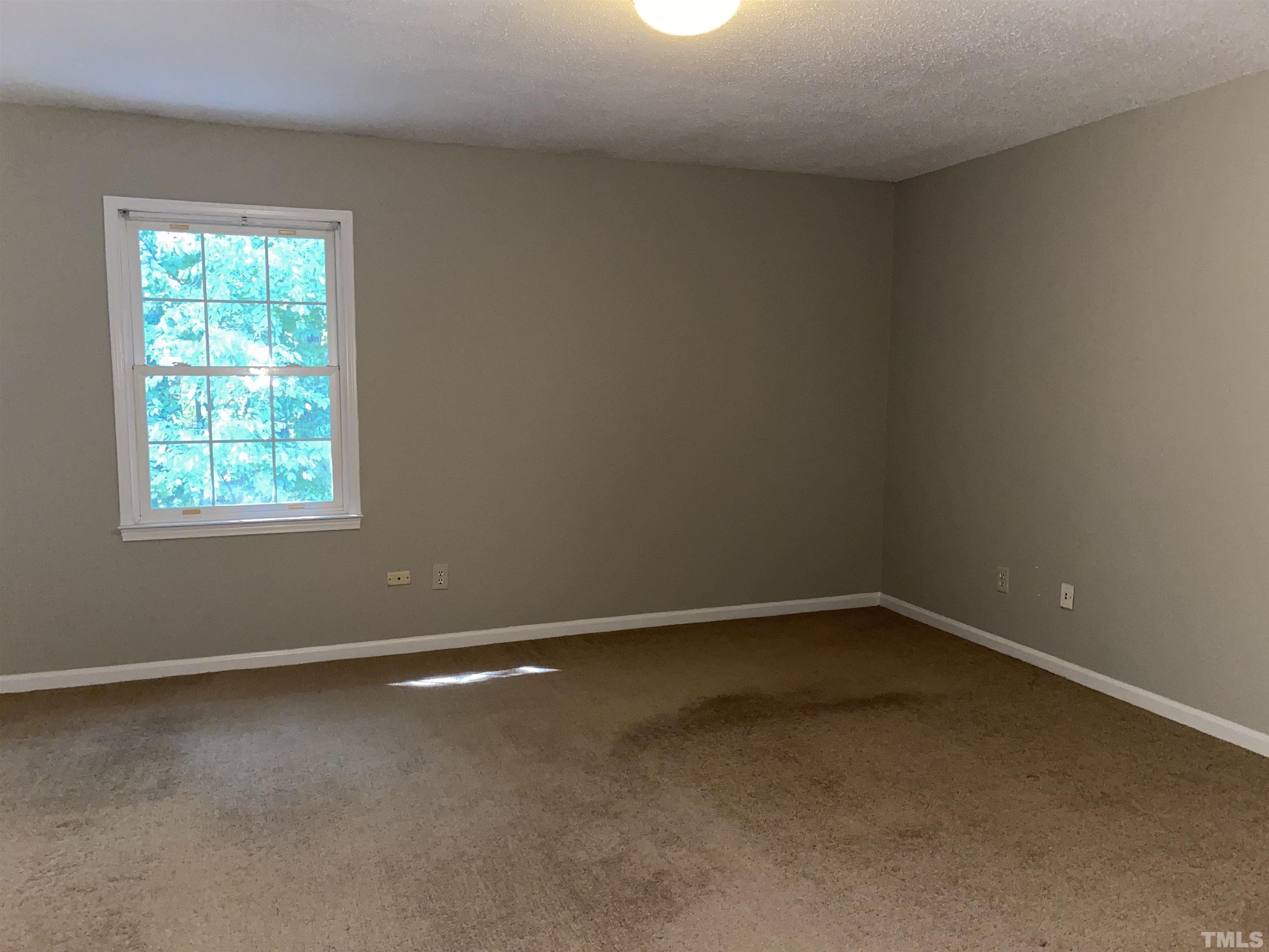 1254 Donaldson Court Cary, NC 27511 - Photo 6 of 8 an empty room with a window
