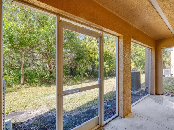 a view of outdoor space with trees all around