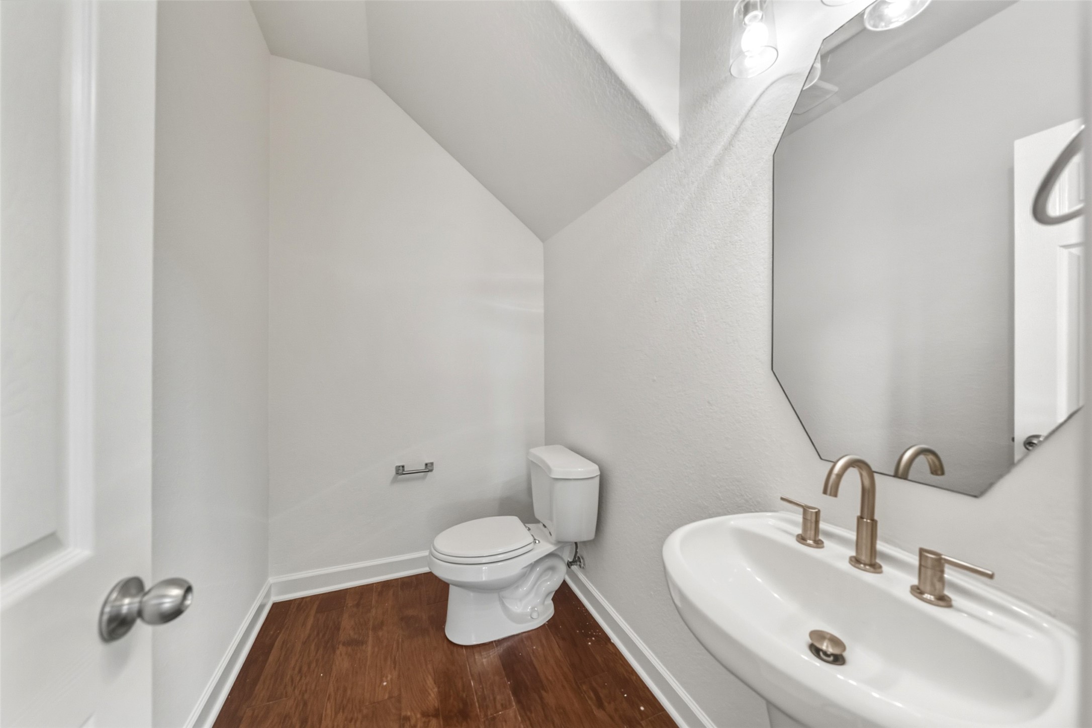 3103 Trail Ridge Drive Pearland, TX 77584 - Photo 15 of 35 a bathroom with a toilet sink and mirror