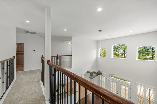 a view of an entryway with wooden floor