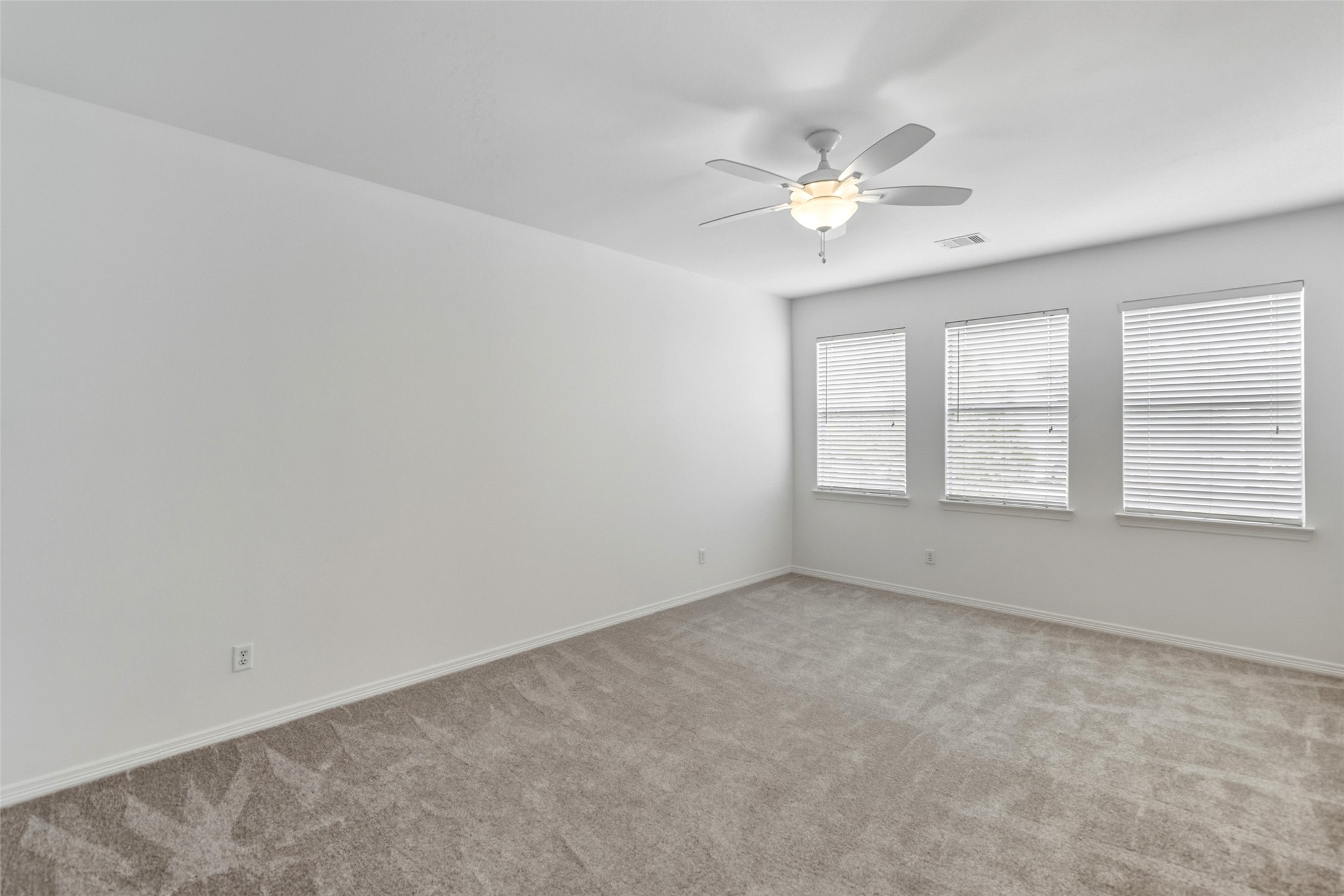 3103 Trail Ridge Drive Pearland, TX 77584 - Photo 28 of 35 a view of an empty room with a window