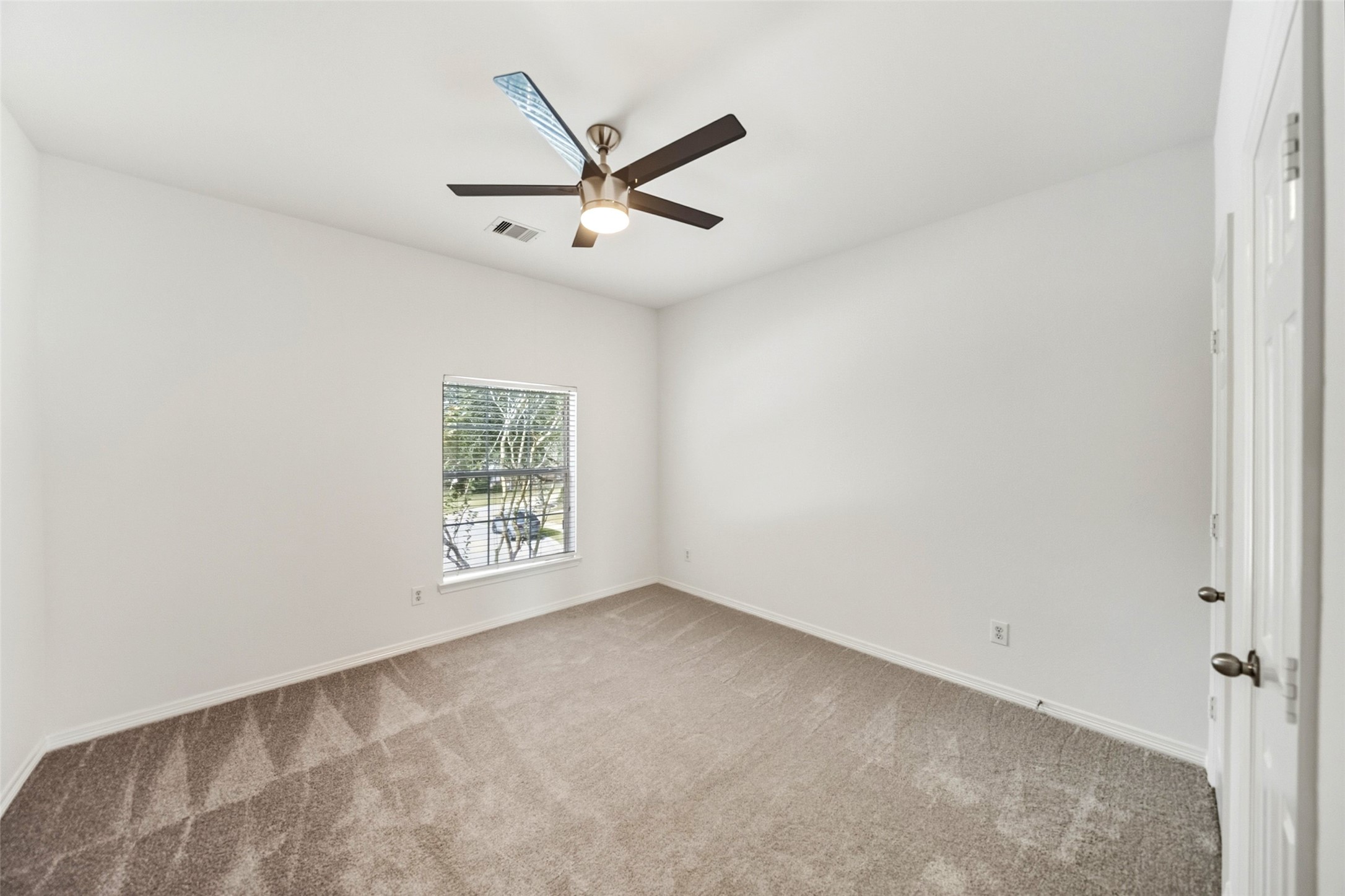 3103 Trail Ridge Drive Pearland, TX 77584 - Photo 29 of 35 a view of an empty room with a window