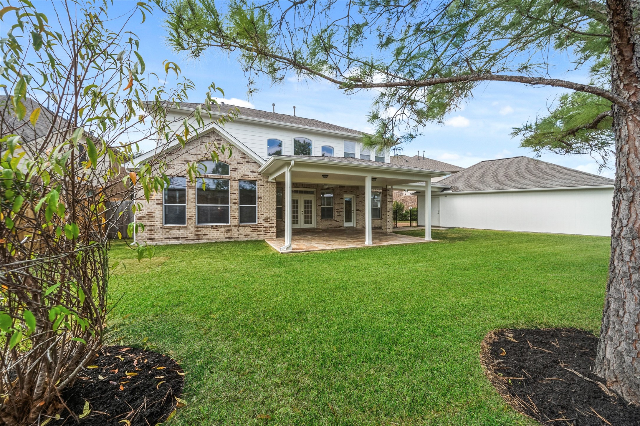 3103 Trail Ridge Drive Pearland, TX 77584 - Photo 34 of 35 a view of a house with a garden