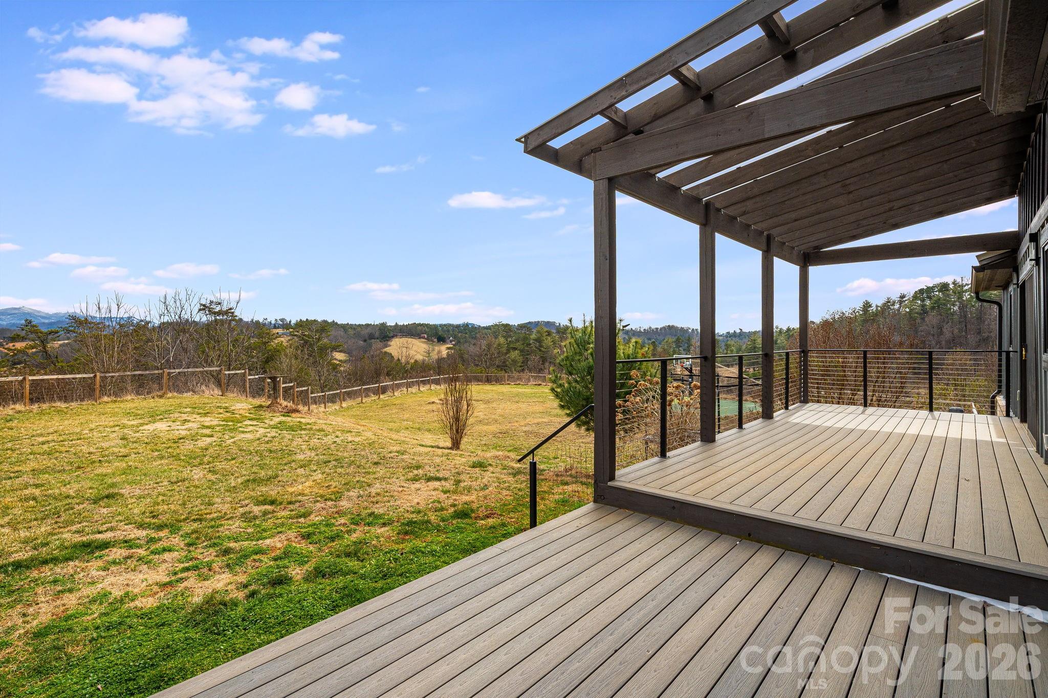 76 Murray De Bruhl Road Alexander, NC 28701 - Photo 16 of 44 a view of a balcony with ocean view