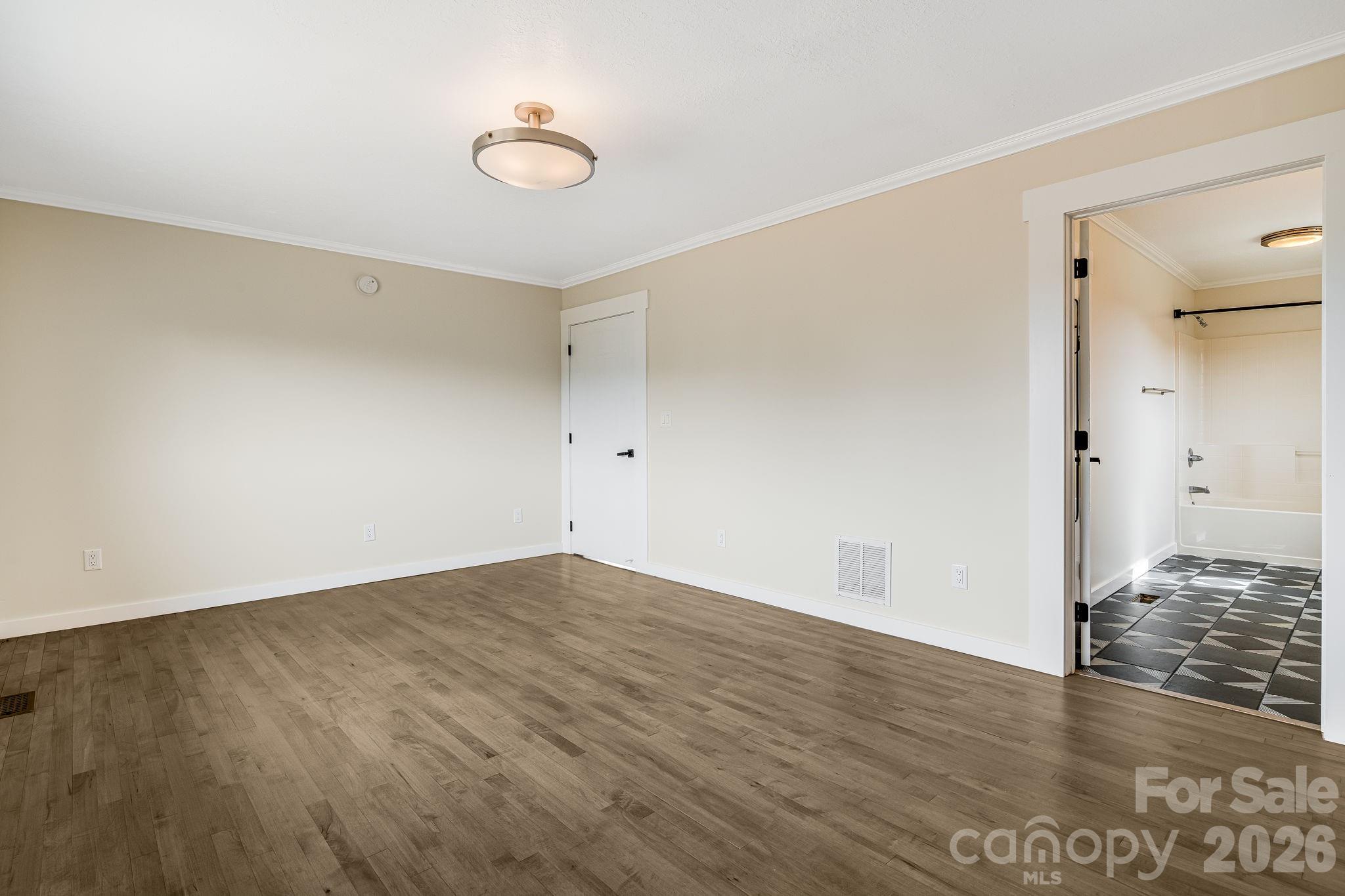 76 Murray De Bruhl Road Alexander, NC 28701 - Photo 18 of 44 wooden floor in an empty room