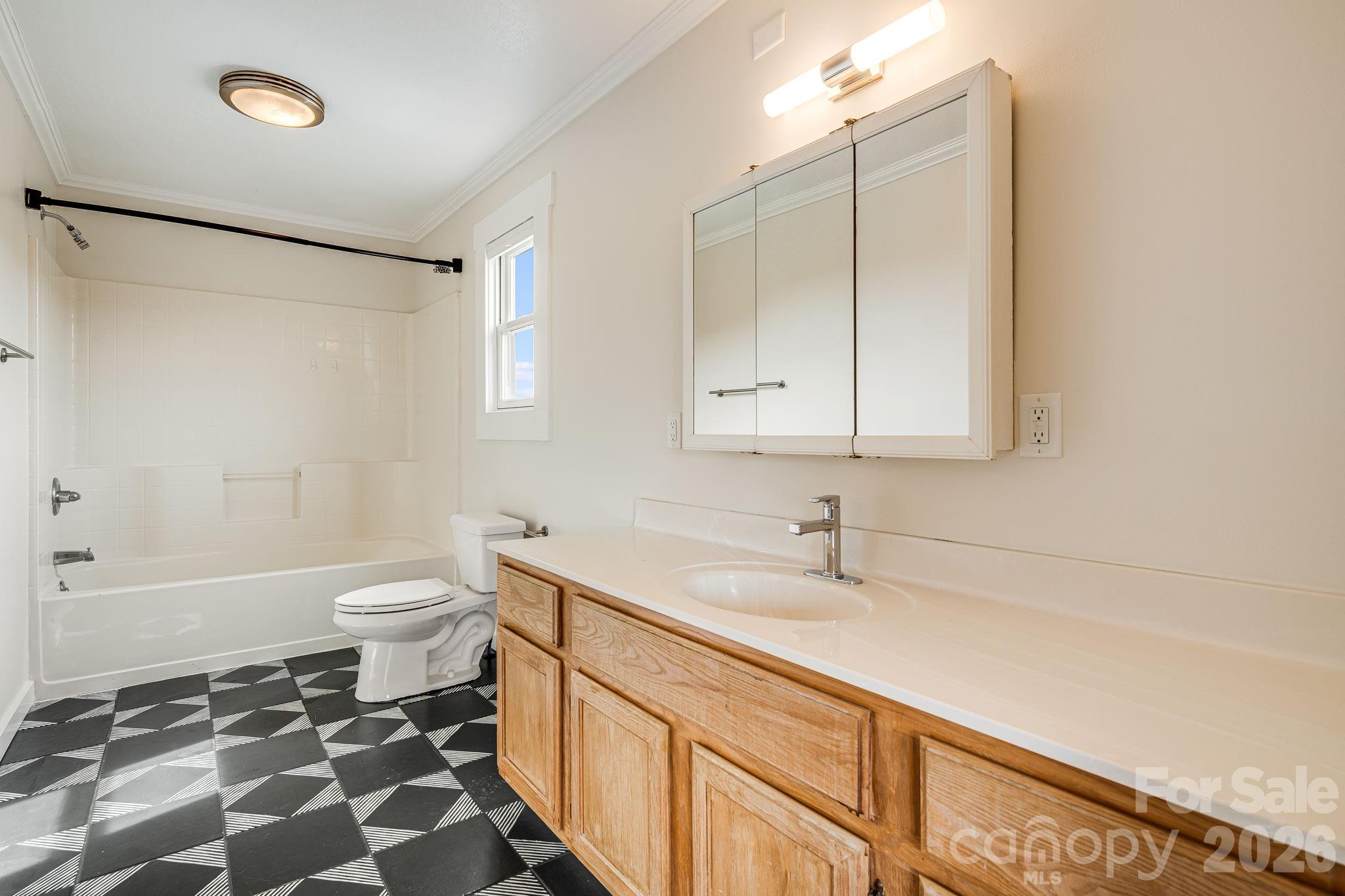 76 Murray De Bruhl Road Alexander, NC 28701 - Photo 19 of 44 a bathroom with a sink toilet and shower