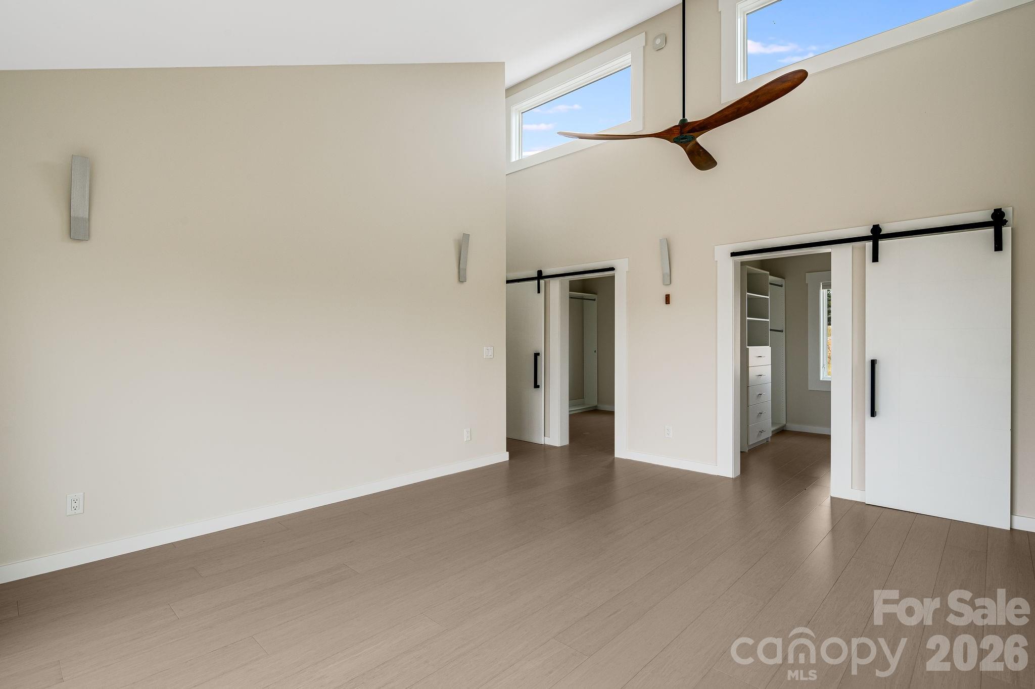76 Murray De Bruhl Road Alexander, NC 28701 - Photo 23 of 44 a view of a hallway with wooden floor