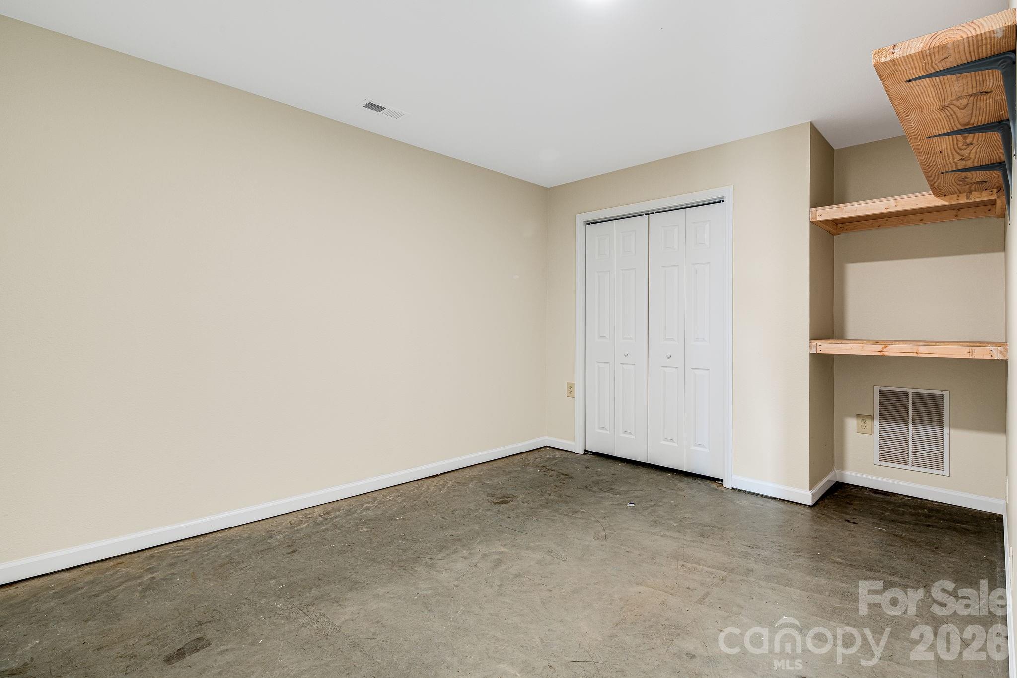 76 Murray De Bruhl Road Alexander, NC 28701 - Photo 34 of 44 a view of an empty room