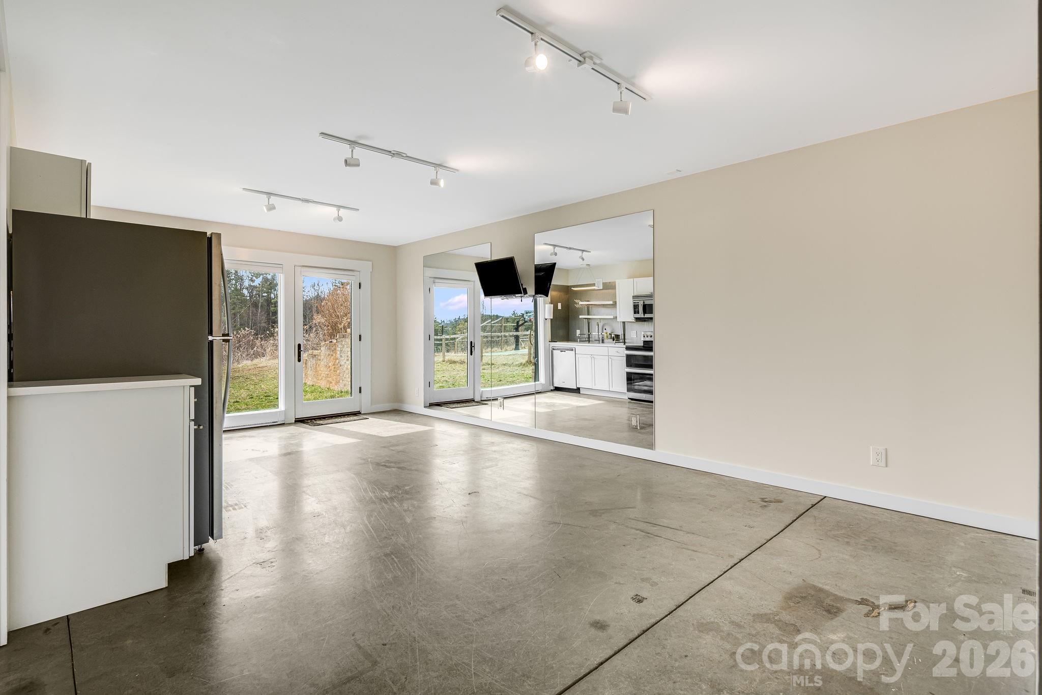 76 Murray De Bruhl Road Alexander, NC 28701 - Photo 35 of 44 a view of a livingroom with a kitchen