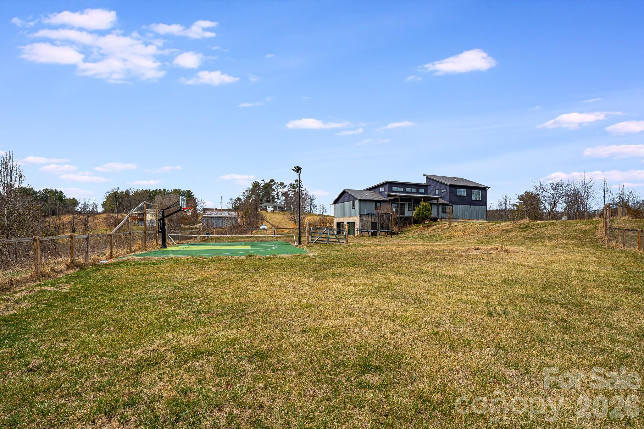 76 Murray De Bruhl Road Alexander, NC 28701 - Photo 41 of 44 a swimming pool with trees in the background