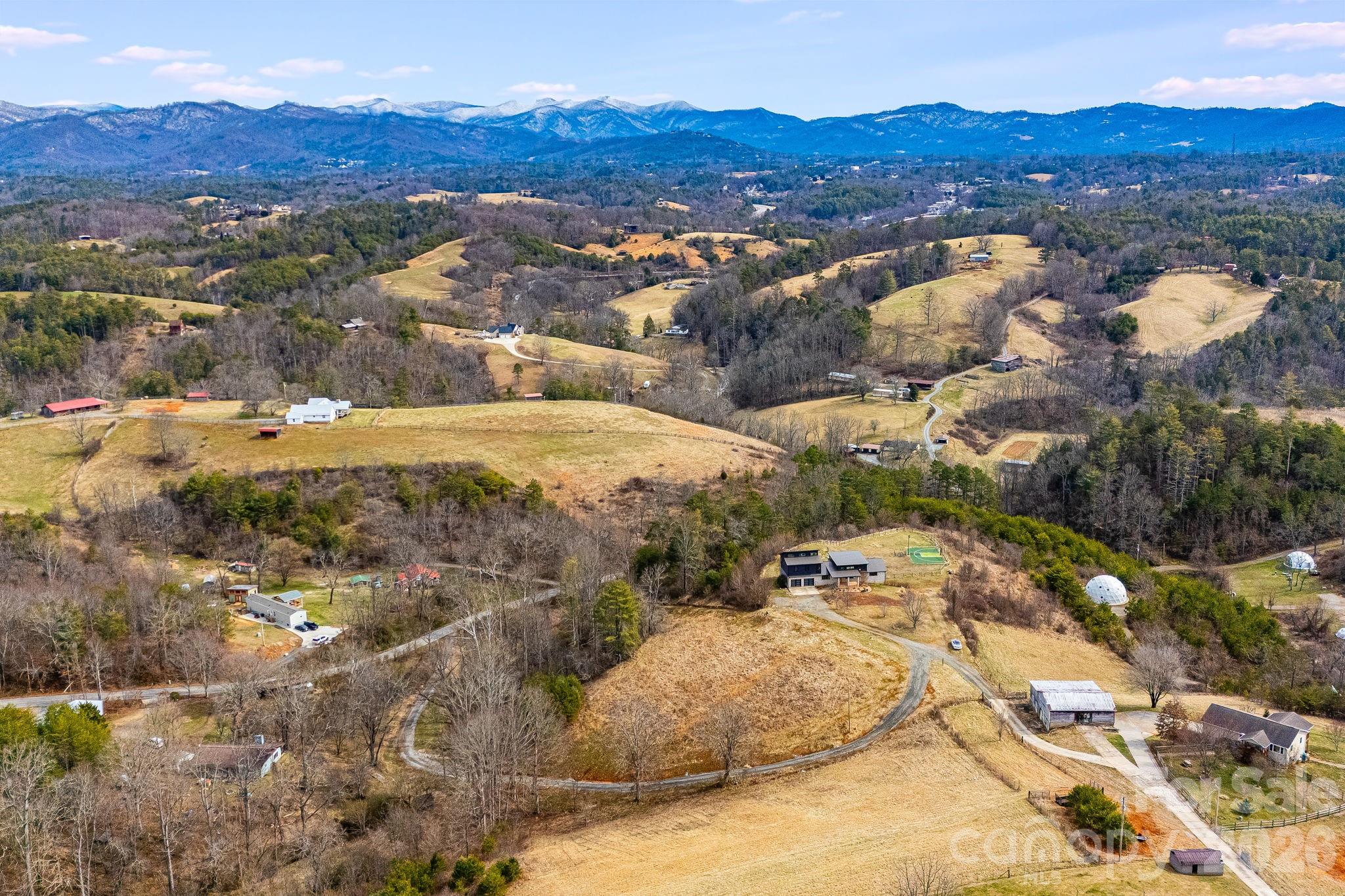76 Murray De Bruhl Road Alexander, NC 28701 - Photo 42 of 44 a view of a backyard with a sink