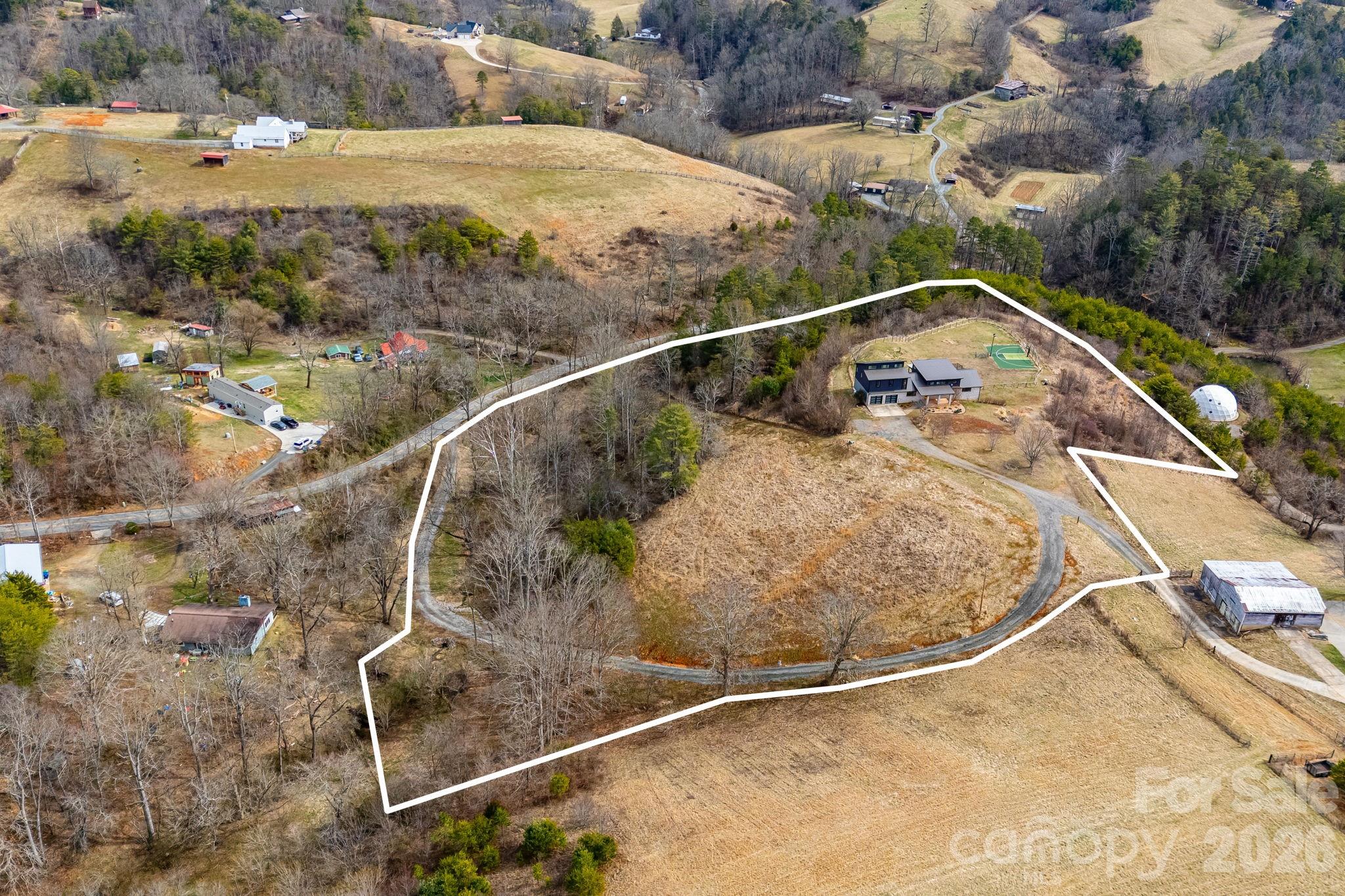 76 Murray De Bruhl Road Alexander, NC 28701 - Photo 43 of 44 a view of a balcony with water view
