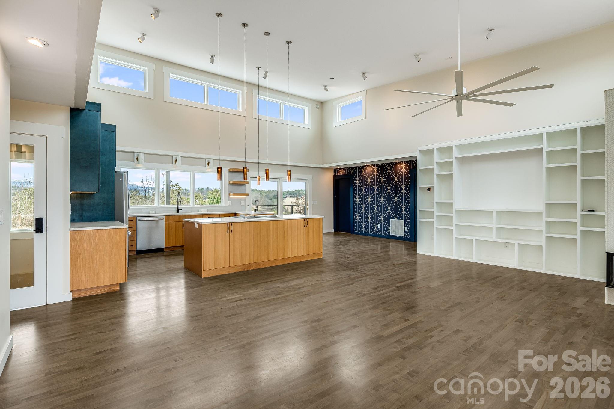 76 Murray De Bruhl Road Alexander, NC 28701 - Photo 6 of 44 a view of kitchen with furniture and wooden floor
