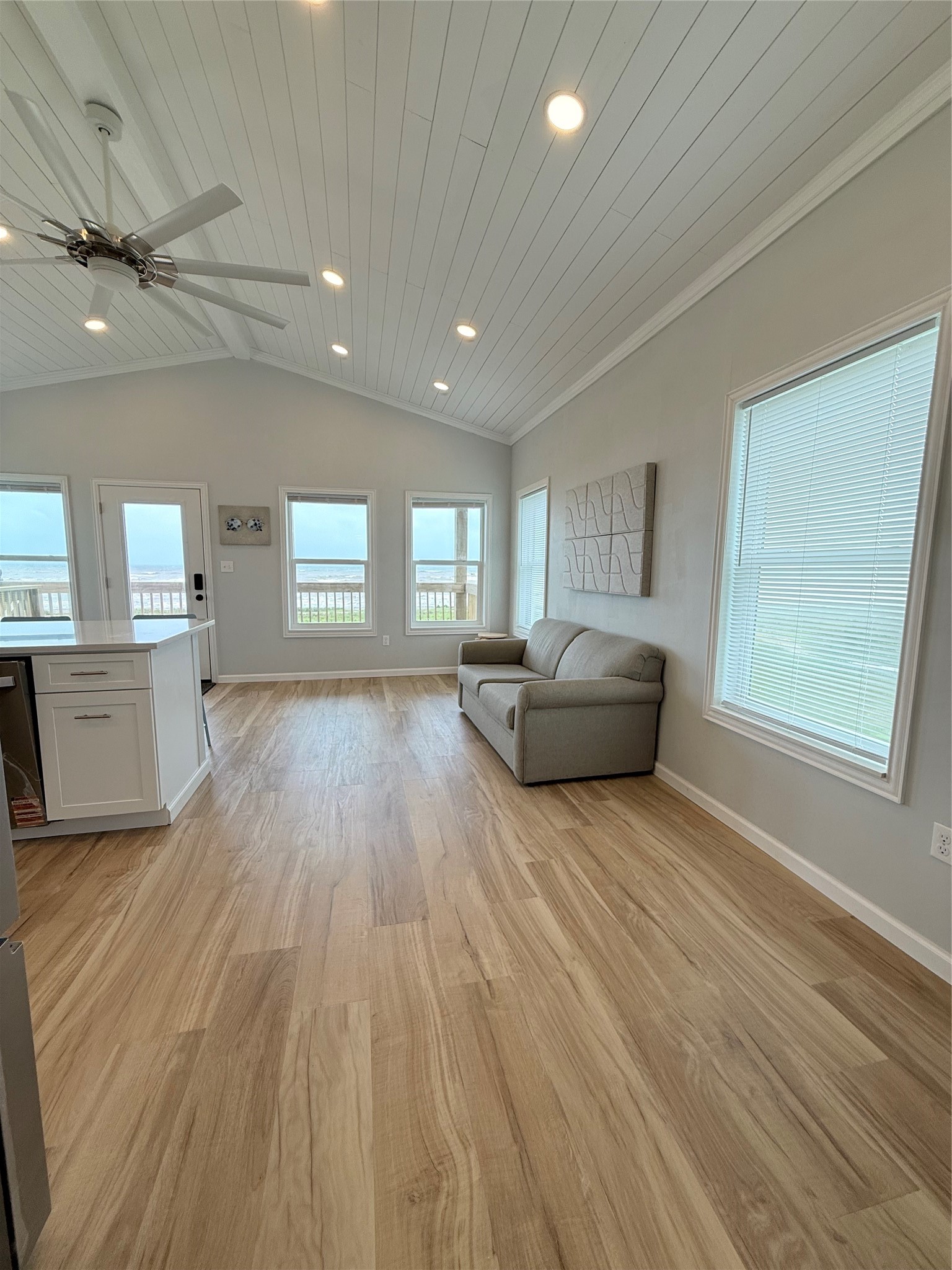 2154 County Road 230 Sargent, TX 77414 - Photo 28 of 30 a living room with furniture and a wooden floor