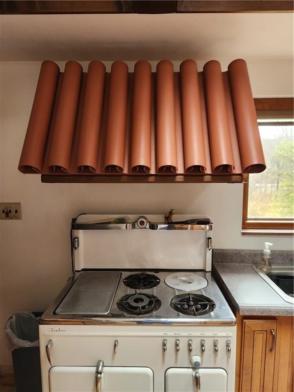 5330 Greensburg Road Apollo, PA 15613 - Photo 13 of 39 a kitchen with a stove and a cabinet