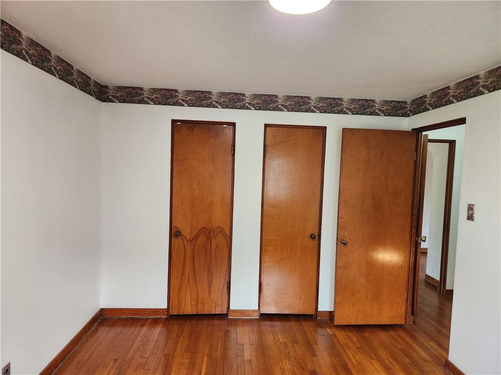 5330 Greensburg Road Apollo, PA 15613 - Photo 20 of 39 an empty room with wooden floor and closet