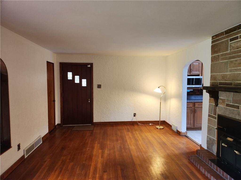 5330 Greensburg Road Apollo, PA 15613 - Photo 4 of 39 a view of empty room with wooden floor and fan