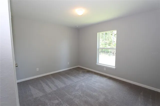 an empty room with a window