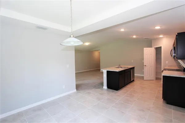 a living room with a couch and a flat screen tv