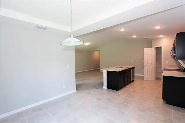 a living room with a couch and a flat screen tv