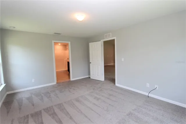 an empty room with an entryway