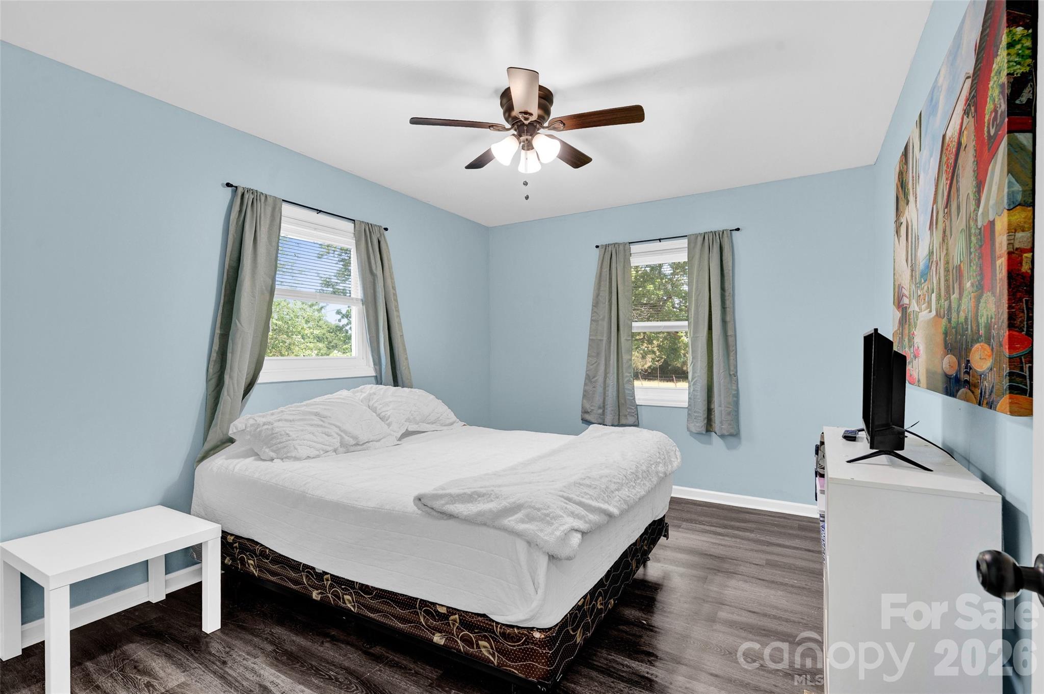3033 West Highway 10 Conover, NC 28613 - Photo 20 of 26 a bedroom with a bed and a flat screen tv