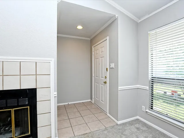 a view of kitchen with furniture and window