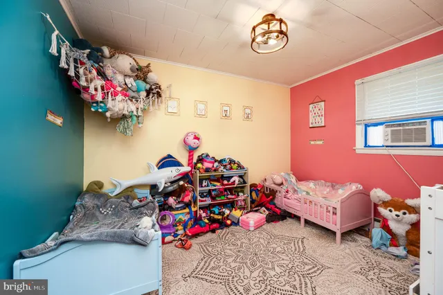 a view of kids room with toys