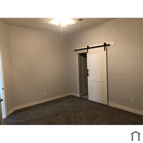 a black and white photo of a shower