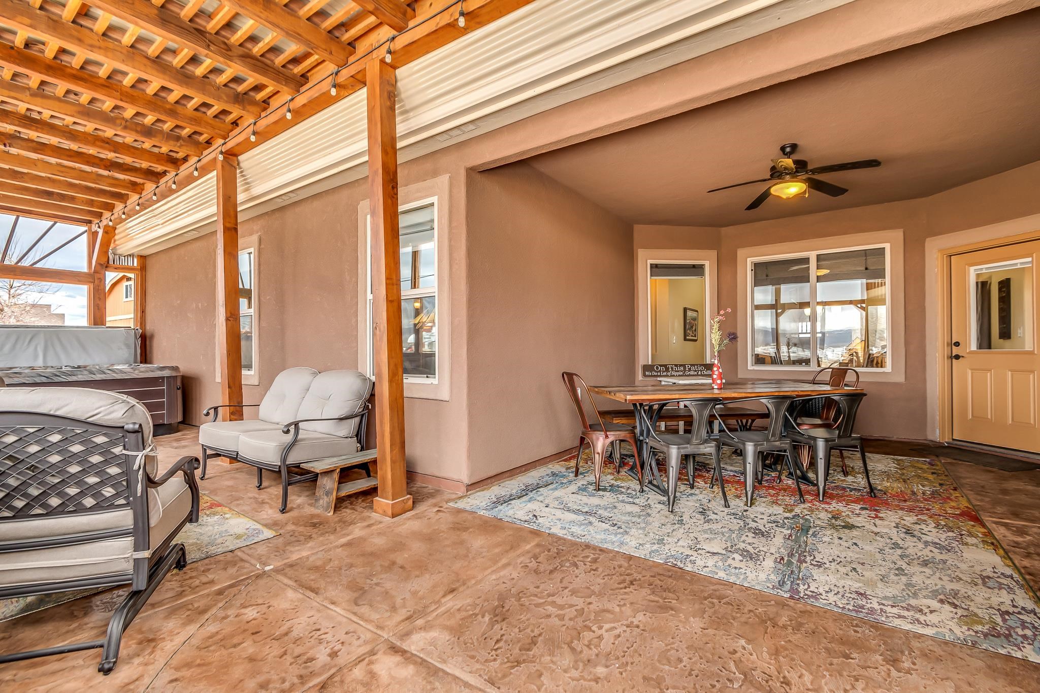 2028 Roma Avenue Fruita, CO 81521 - Photo 23 of 41 a view of a dining room with furniture window and outside view