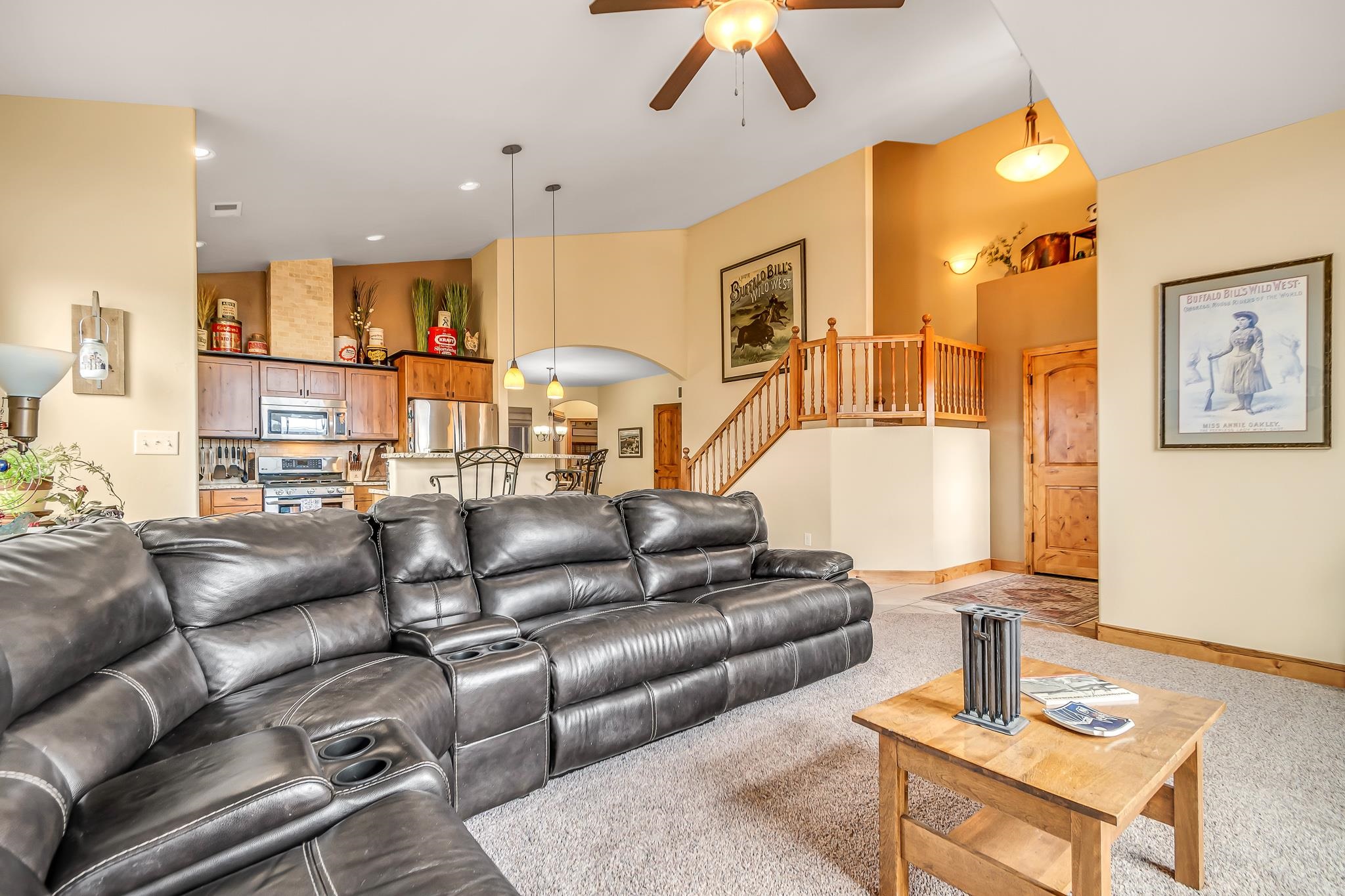 2028 Roma Avenue Fruita, CO 81521 - Photo 3 of 41 a living room with furniture and a chandelier