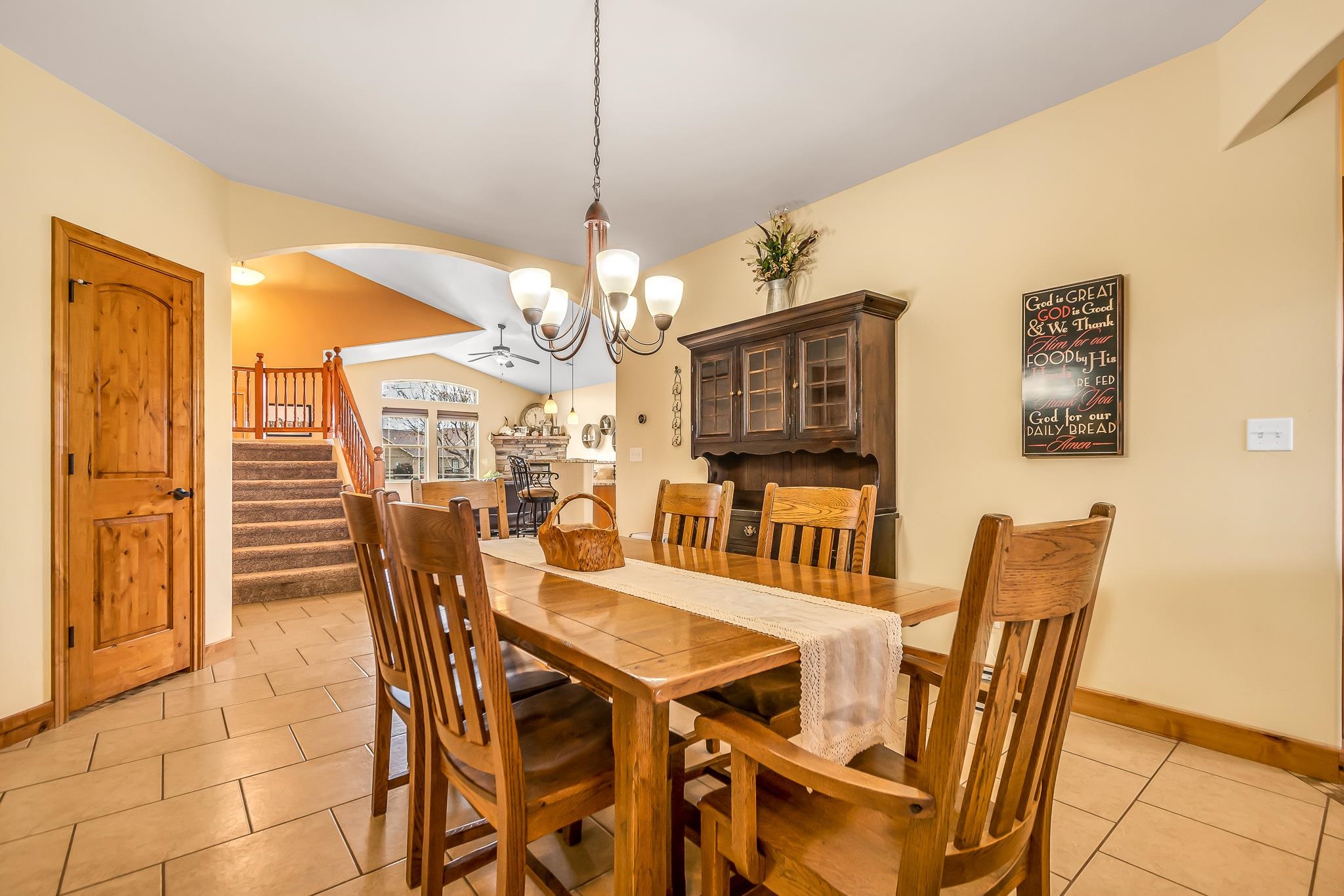 2028 Roma Avenue Fruita, CO 81521 - Photo 8 of 41 a view of a dining room with furniture and a chandelier