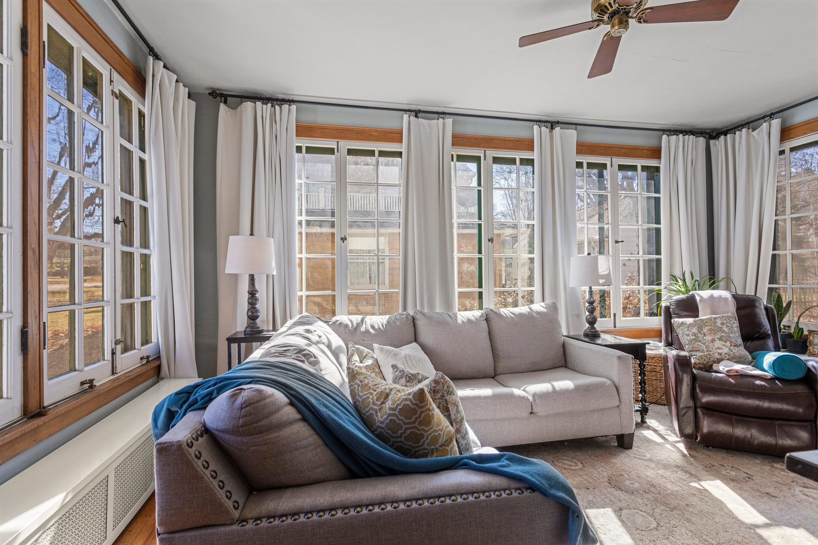 1124 North State Street Monticello, IL 61856 - Photo 13 of 53 a living room with furniture and floor to ceiling windows