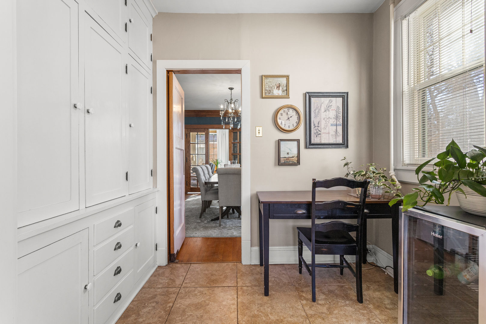1124 North State Street Monticello, IL 61856 - Photo 22 of 53 a view of a hallway that has a table and a chair in it